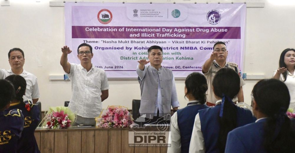 Participants take the anti-drug pledge during the observance of the International Day Against Drug Abuse and Illicit Trafficking at the DC's Conference Hall, Kohima, on June 26. (DIPR Photo)